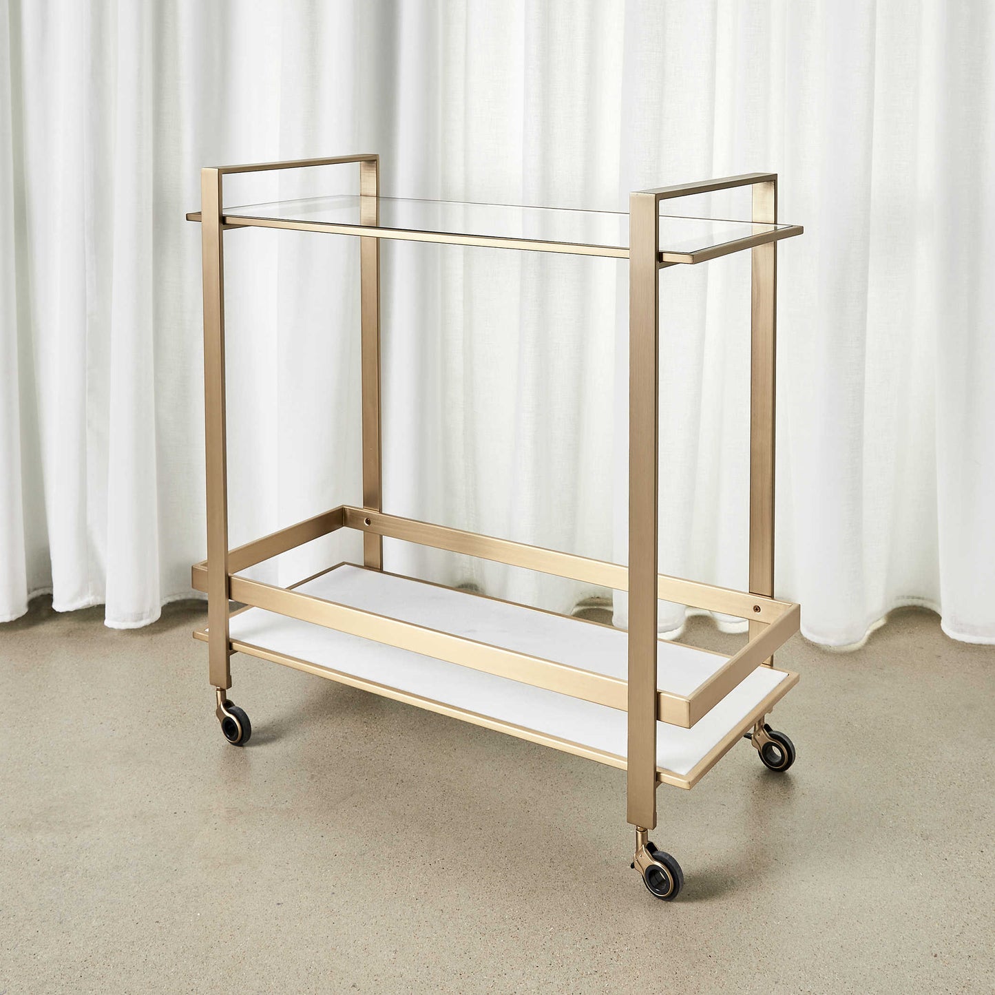ROLL ALONG BAR CART - BRASS
