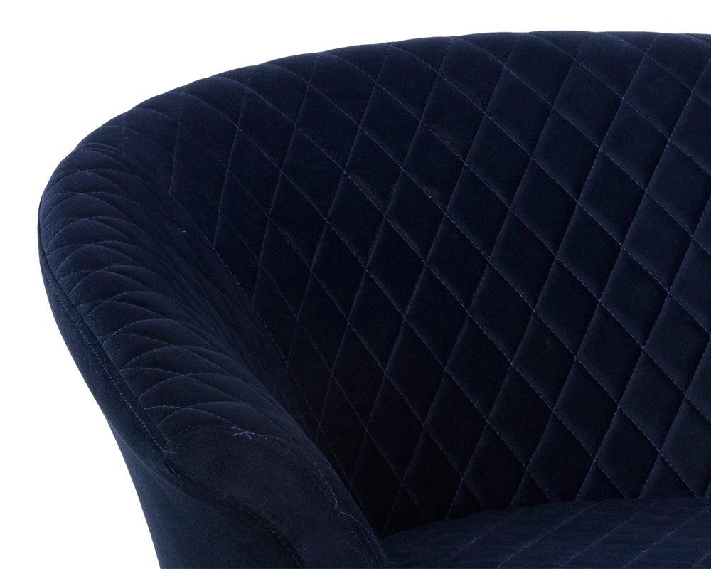 Sillón giratorio Carine